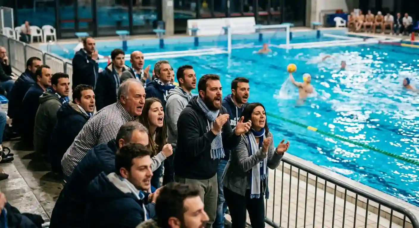 Tifosi seguono dal vivo una partita di pallanuoto in piscina coperta